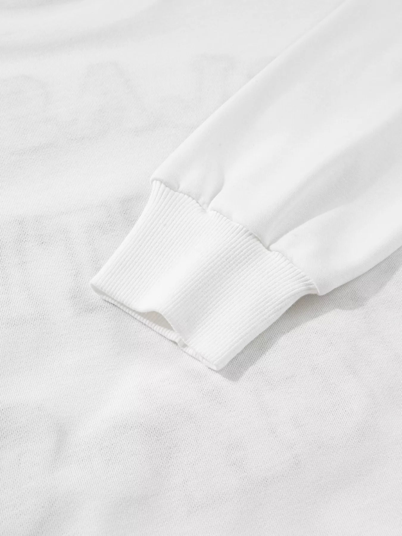 White Kickoff Queen sweatshirt with bold varsity lettering, cozy oversized fit, and casual sporty game day style.