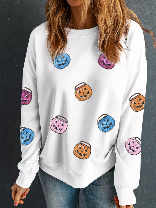Halloween sweatshirt with sequin pumpkin lantern patches – Lantern Glow style from A Whimsical Affair.
