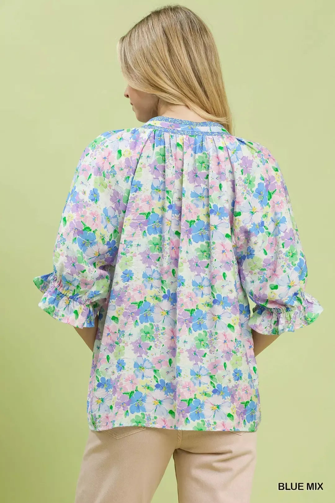 pastel floral ruffle sleeve blouse with lavender and blue watercolor flowers in a romantic boho style