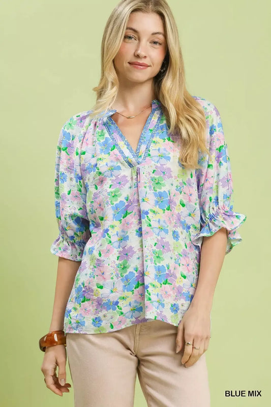 pastel floral ruffle sleeve blouse with lavender and blue watercolor flowers in a romantic boho style