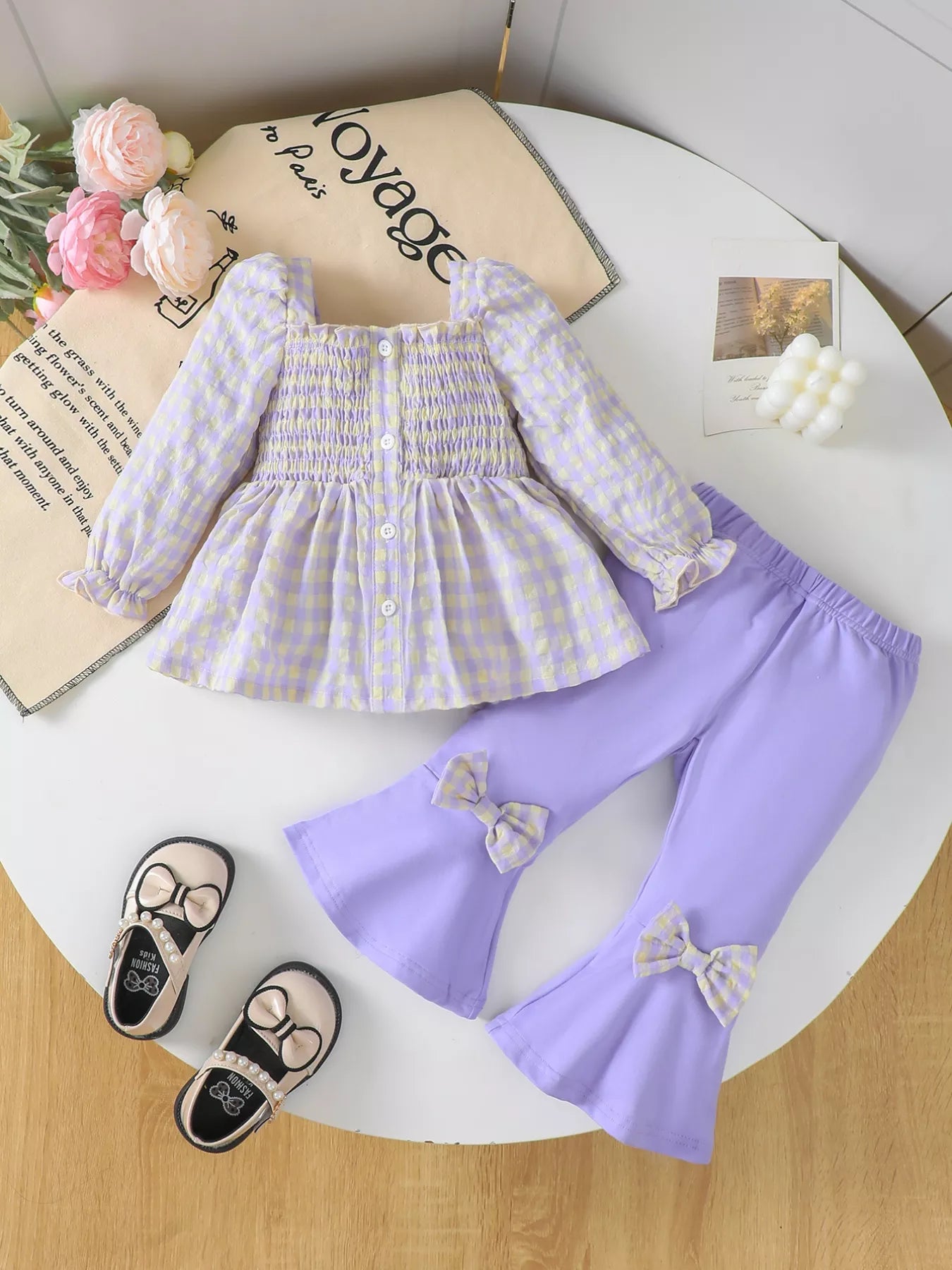 Lavender gingham toddler girl outfit with smocked top and bow detail bell-bottom pants – two-piece kids set
