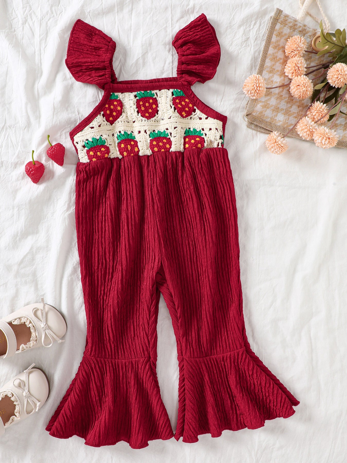 Kids bell-leg jumpsuit with crochet patchwork bodice and flutter straps