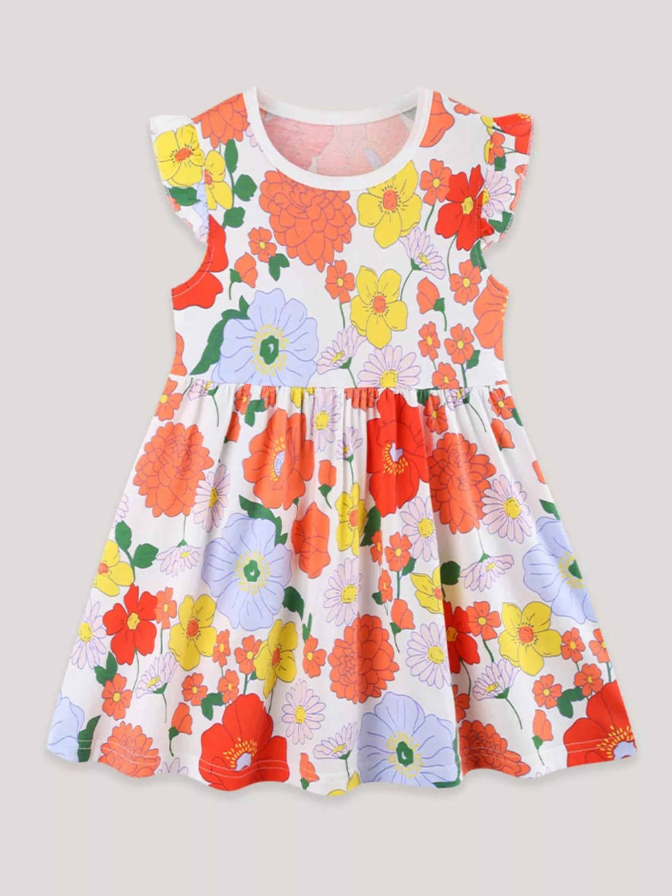 Girls cotton dress with colorful floral print, flutter sleeves, and a flowy skirt styled with white Mary Jane shoes.