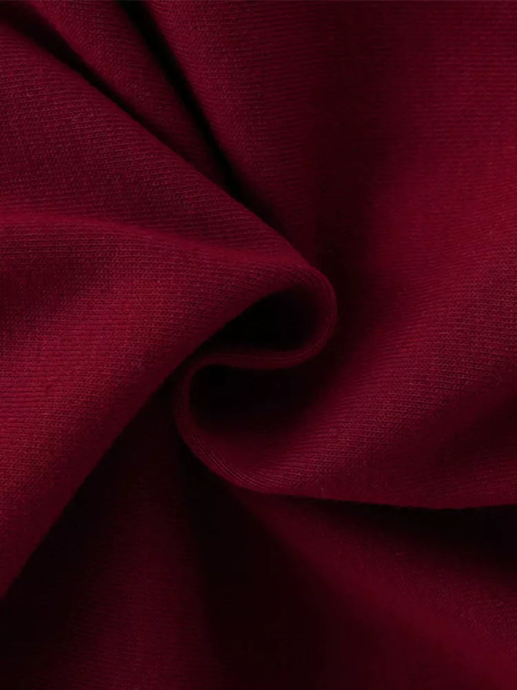 Girls long-sleeve sweatshirt with swan graphic and ruffled tulle hem.