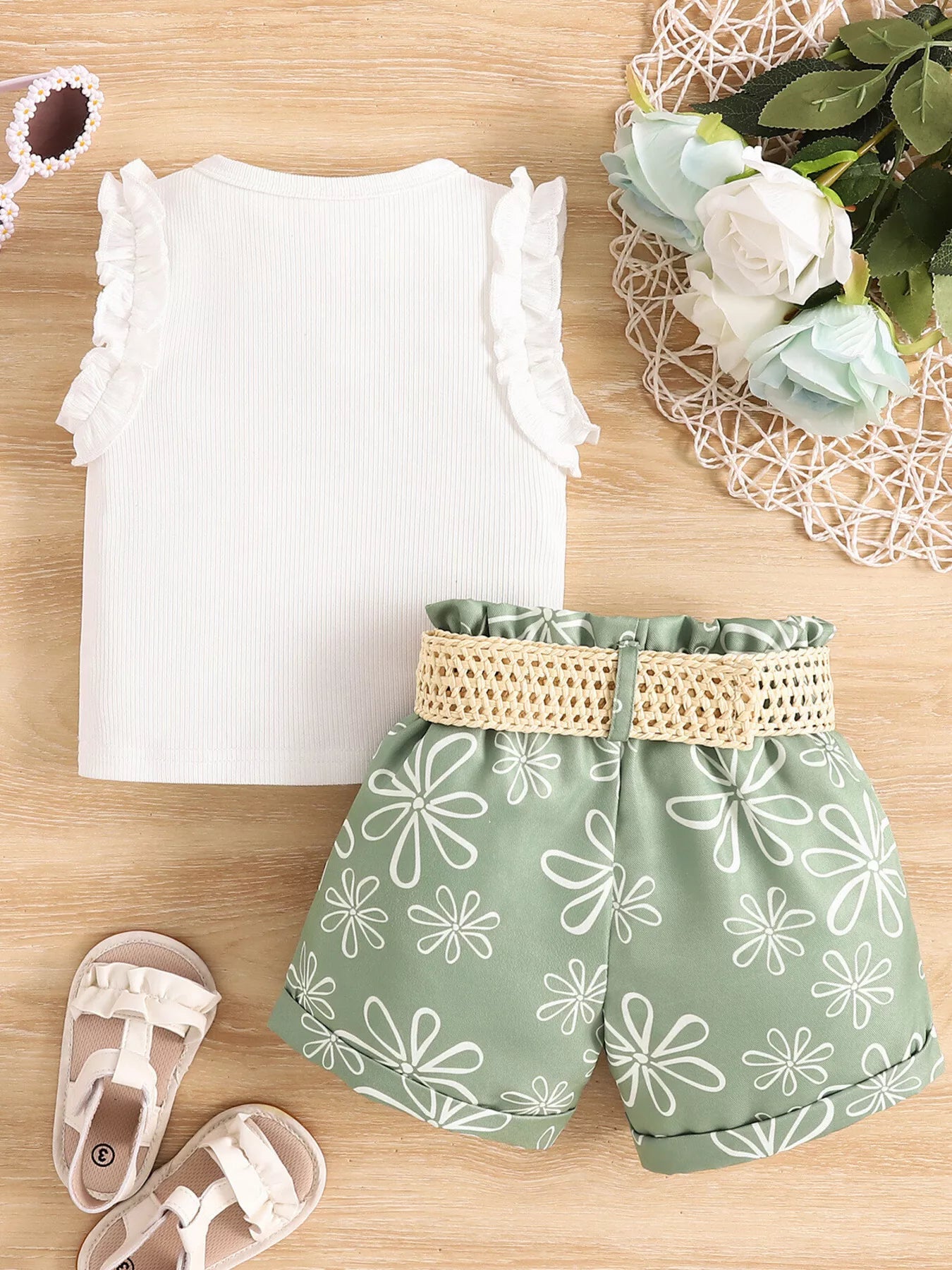 Children’s two-piece outfit with belted detail, soft cotton-blend fabric, and cute everyday styling available in pink and green.