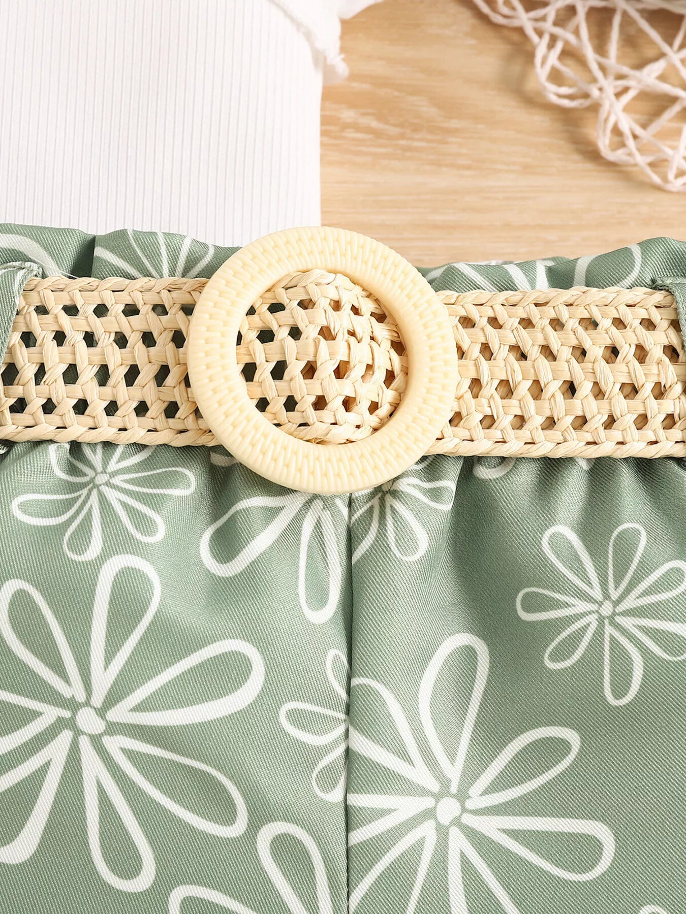 Children’s two-piece outfit with belted detail, soft cotton-blend fabric, and cute everyday styling available in pink and green.