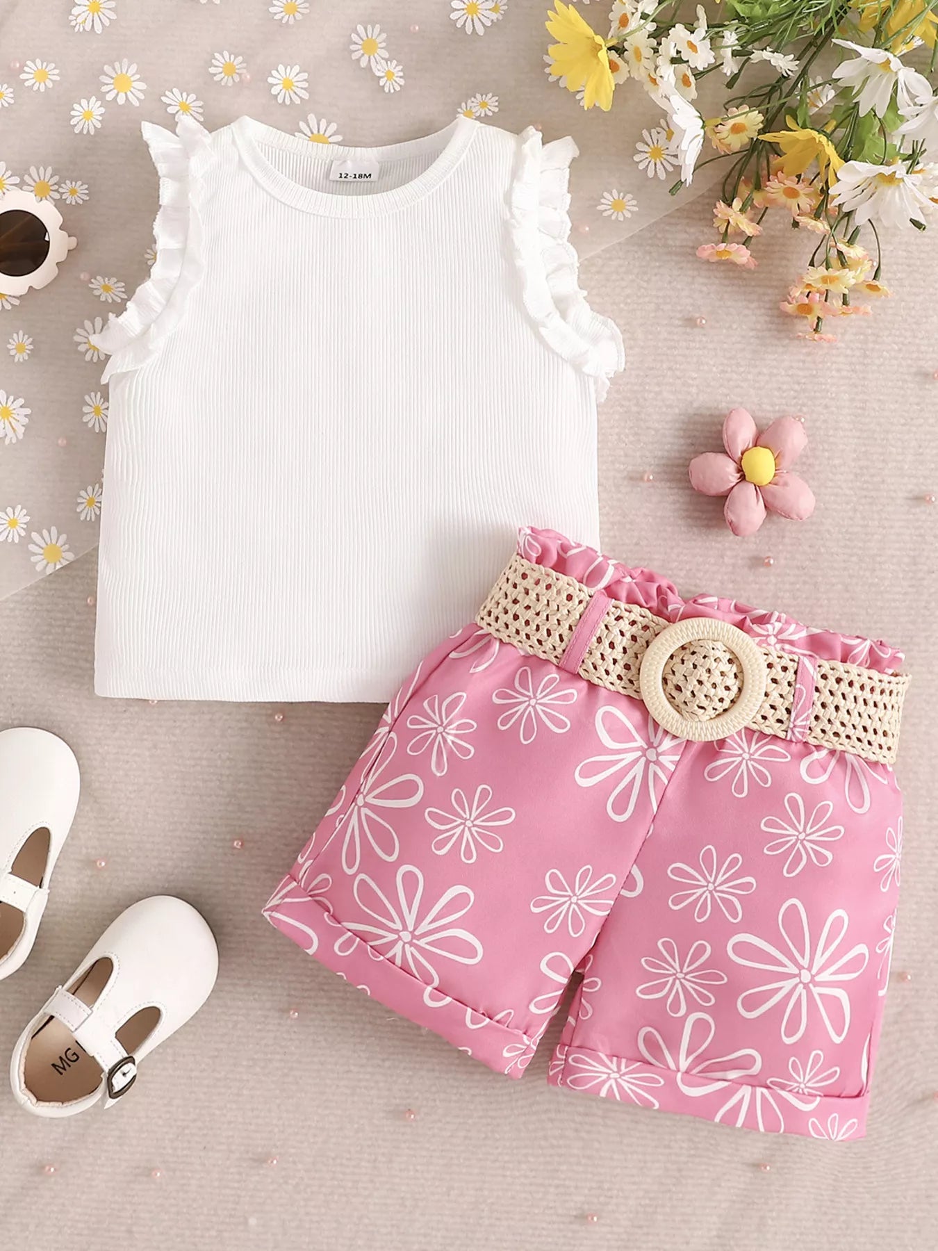 Children’s two-piece outfit with belted detail, soft cotton-blend fabric, and cute everyday styling available in pink and green.