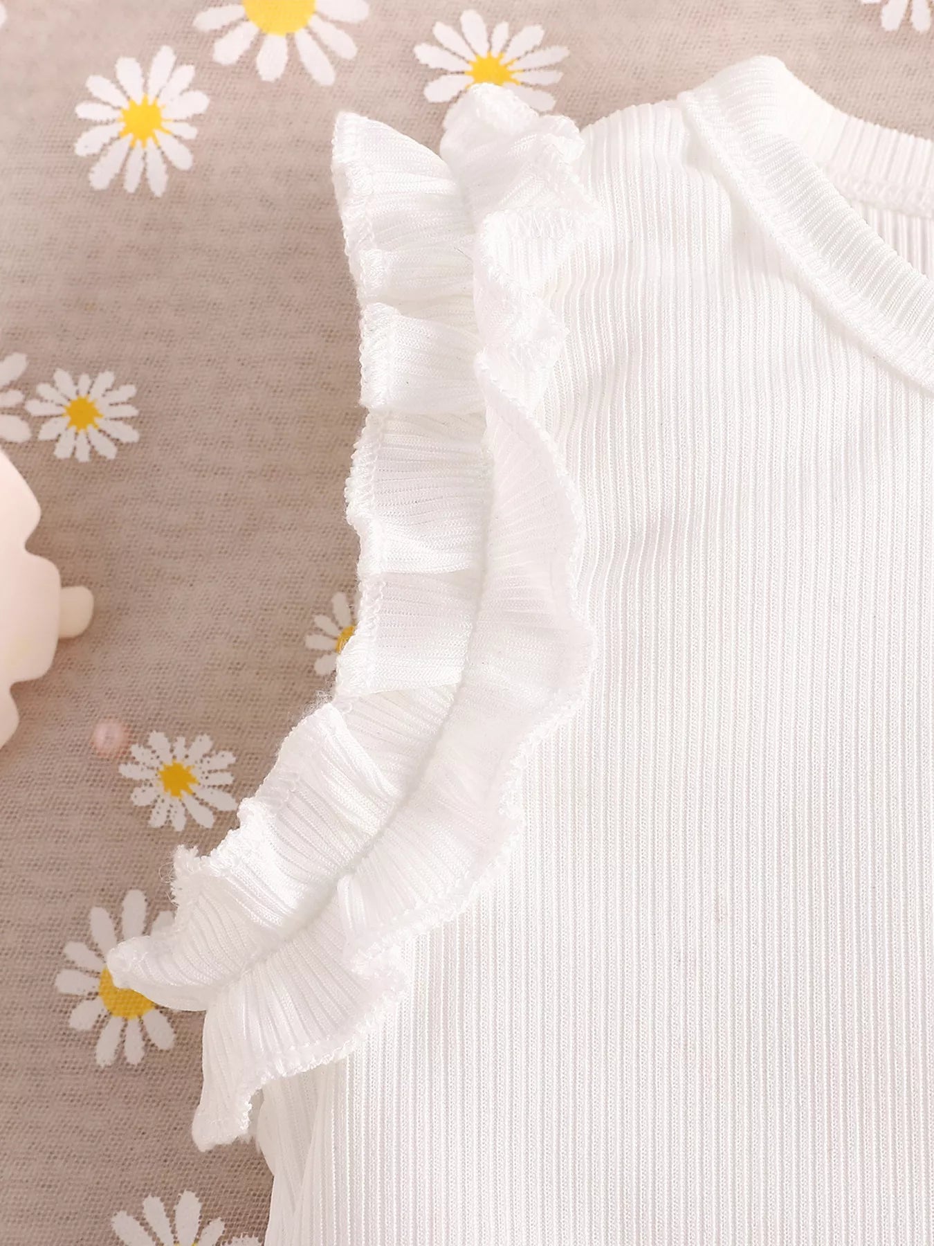 Children’s two-piece outfit with belted detail, soft cotton-blend fabric, and cute everyday styling available in pink and green.