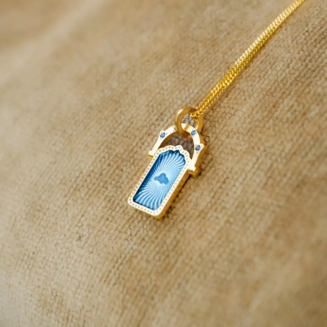 Lucky Charms Pendant Necklace with blue cloud charm on gold-plated chain