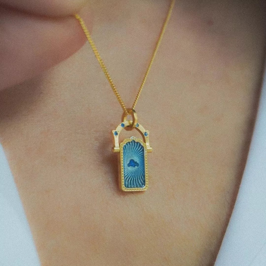 Lucky Charms Pendant Necklace with blue cloud charm on gold-plated chain
