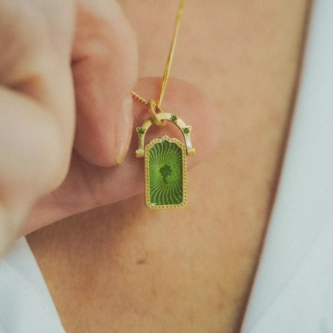 Lucky Charms Pendant Necklace with green clover charm on gold-plated chain