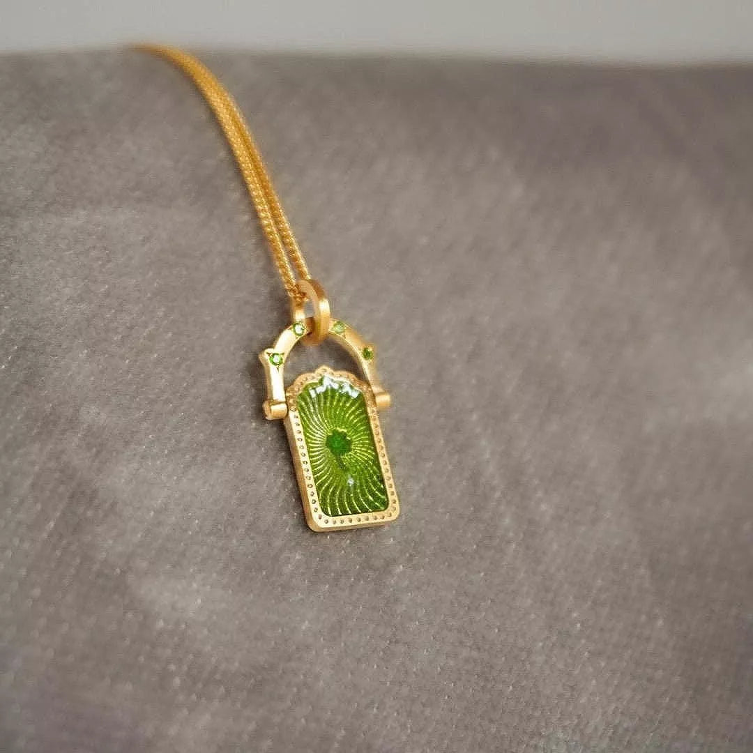 Lucky Charms Pendant Necklace with green clover charm on gold-plated chain