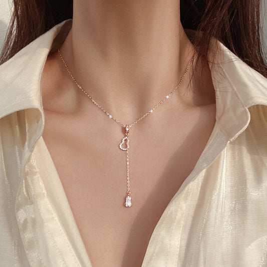 Rose gold necklace with zircon gourd-shaped pendant and drop charm