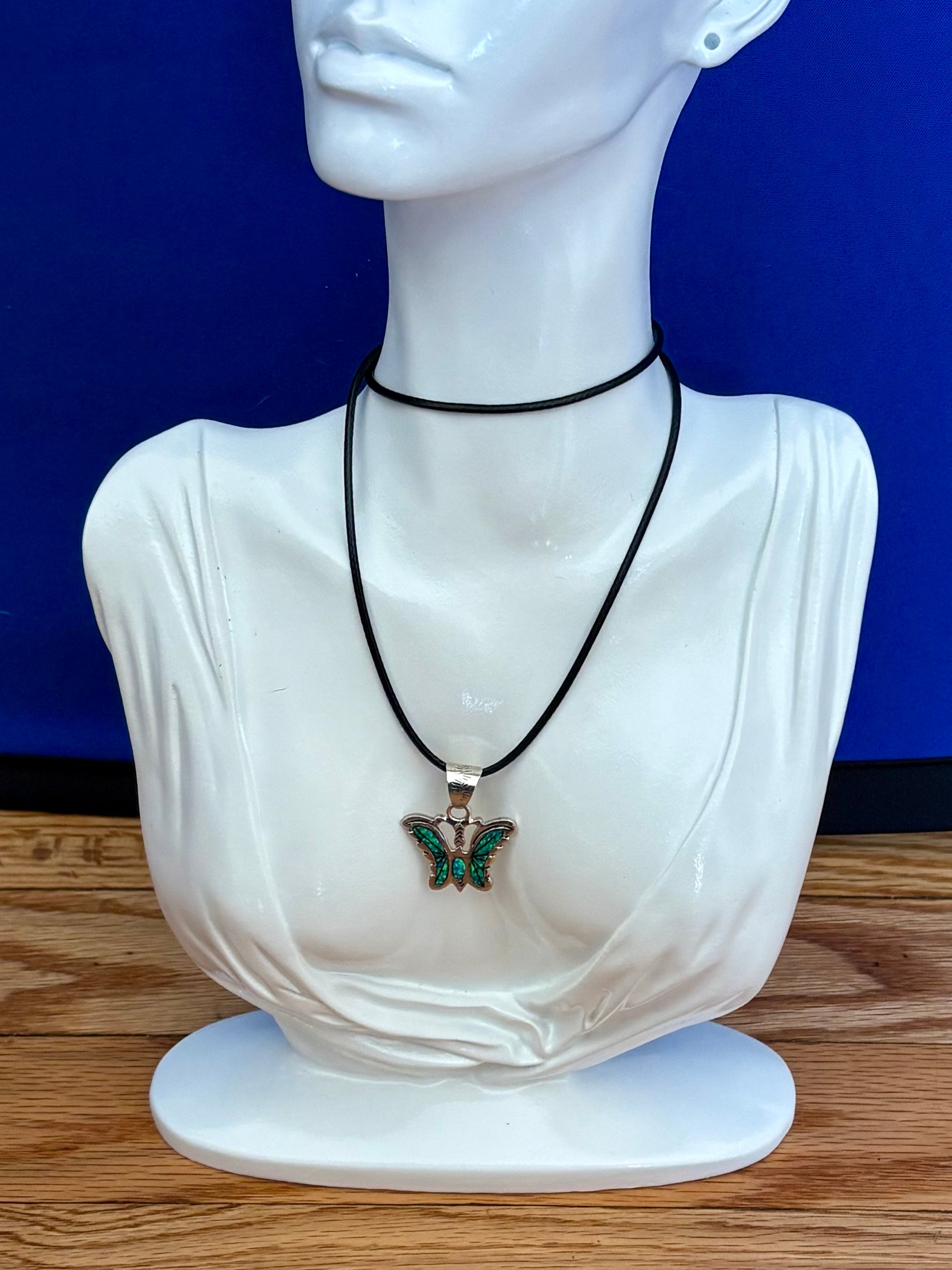 Sterling silver opal butterfly pendant with blue-green opal inlay from the Enchanted Crystals Collection.