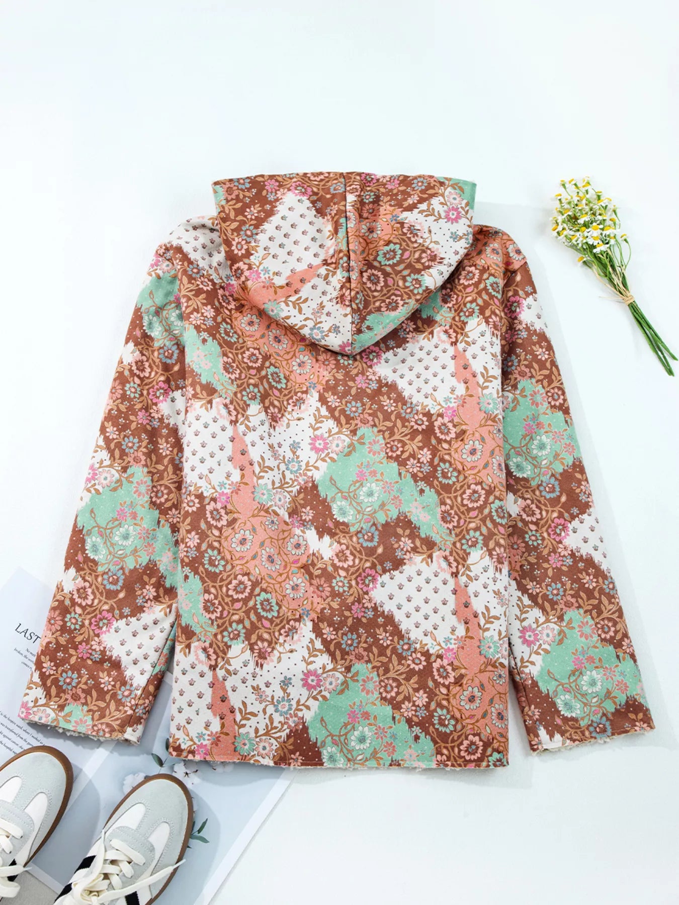 Meadow Bloom Sherpa Jacket – oversized floral printed hooded coat with sherpa lining and front pockets.