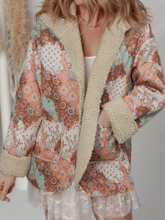 Meadow Bloom Sherpa Jacket – oversized floral printed hooded coat with sherpa lining and front pockets.