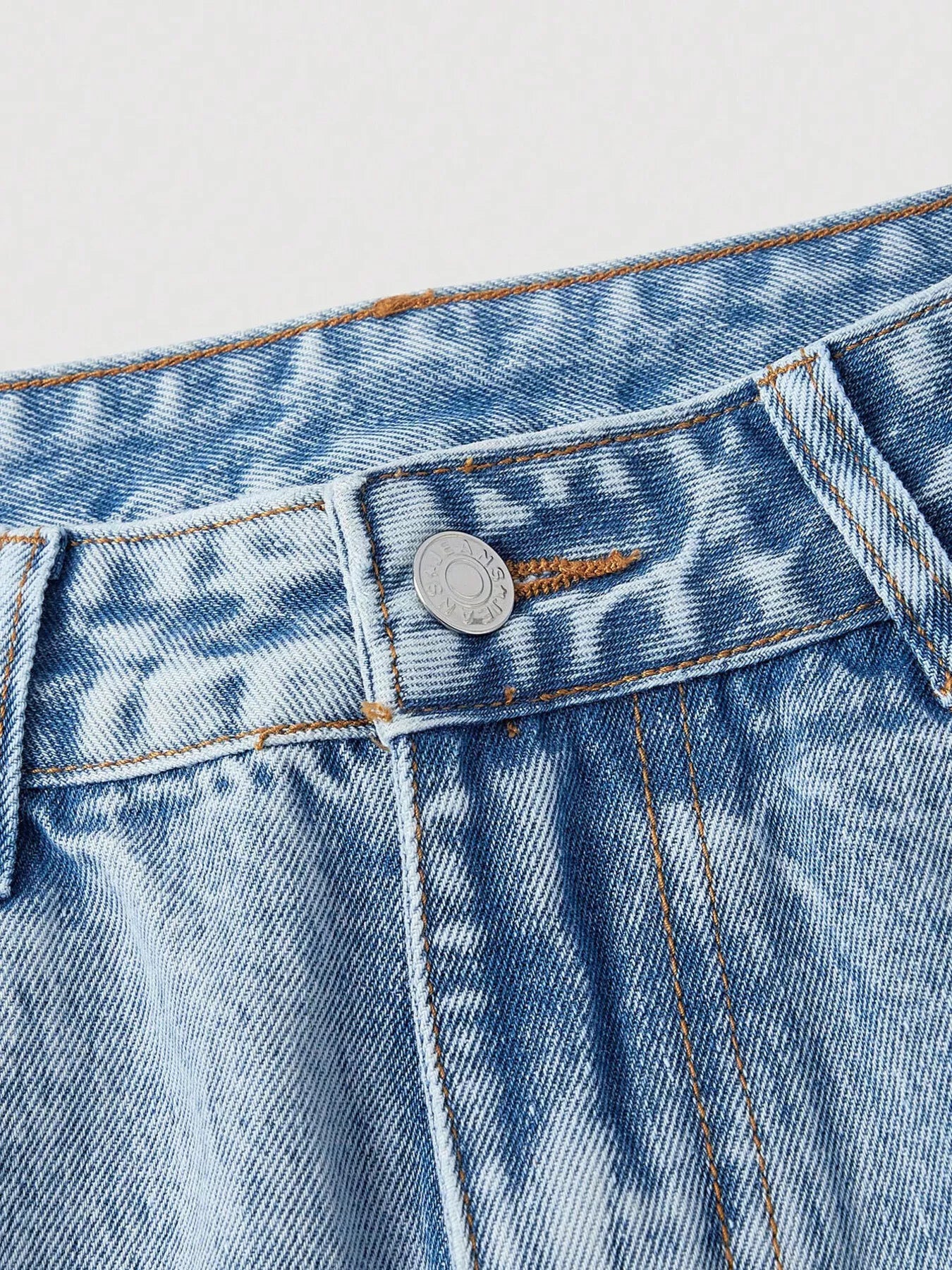 Wide leg jeans with delicate floral embroidery, pocketed design, no-stretch cotton-blend denim, and soft boho garden-inspired style.