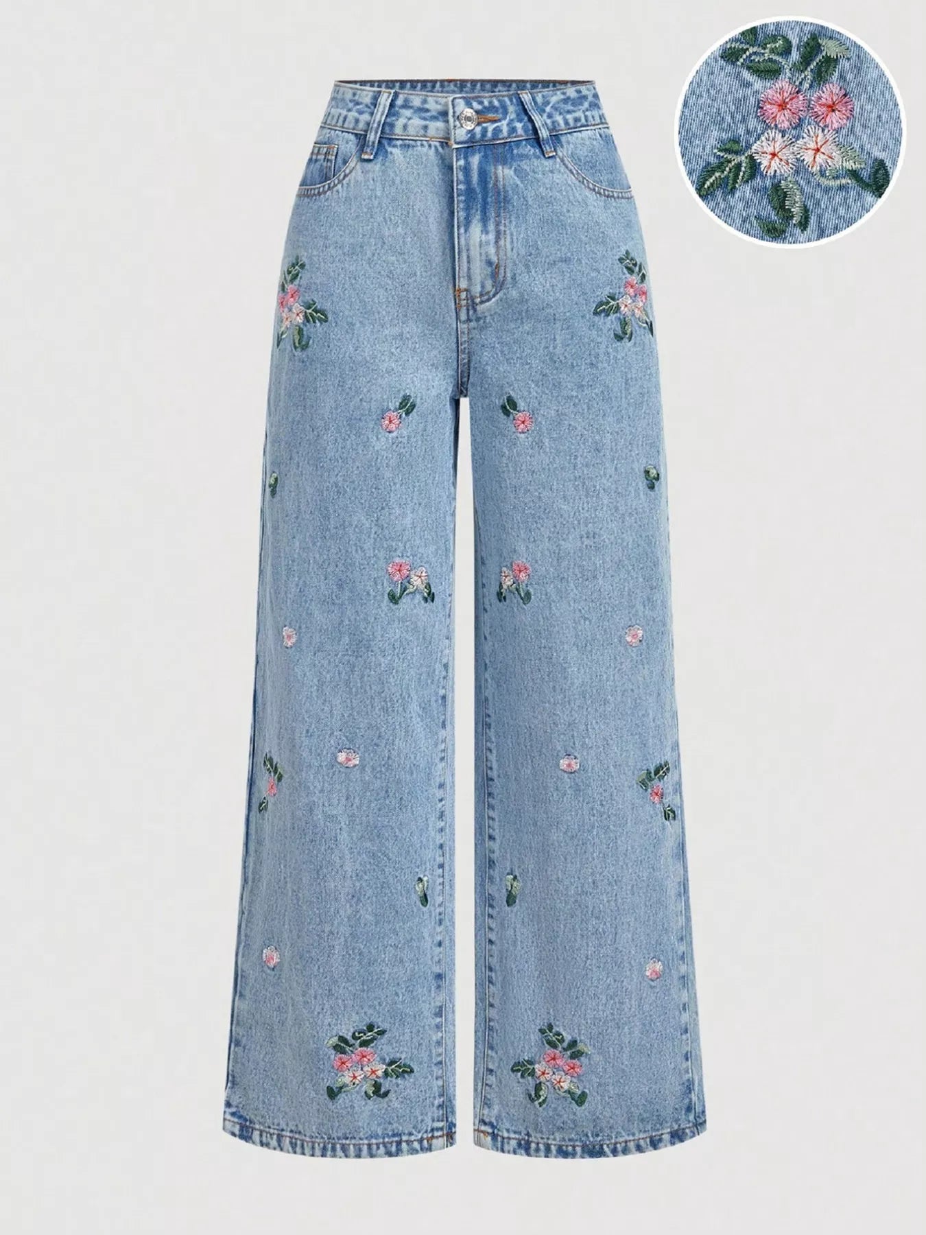 Wide leg jeans with delicate floral embroidery, pocketed design, no-stretch cotton-blend denim, and soft boho garden-inspired style.