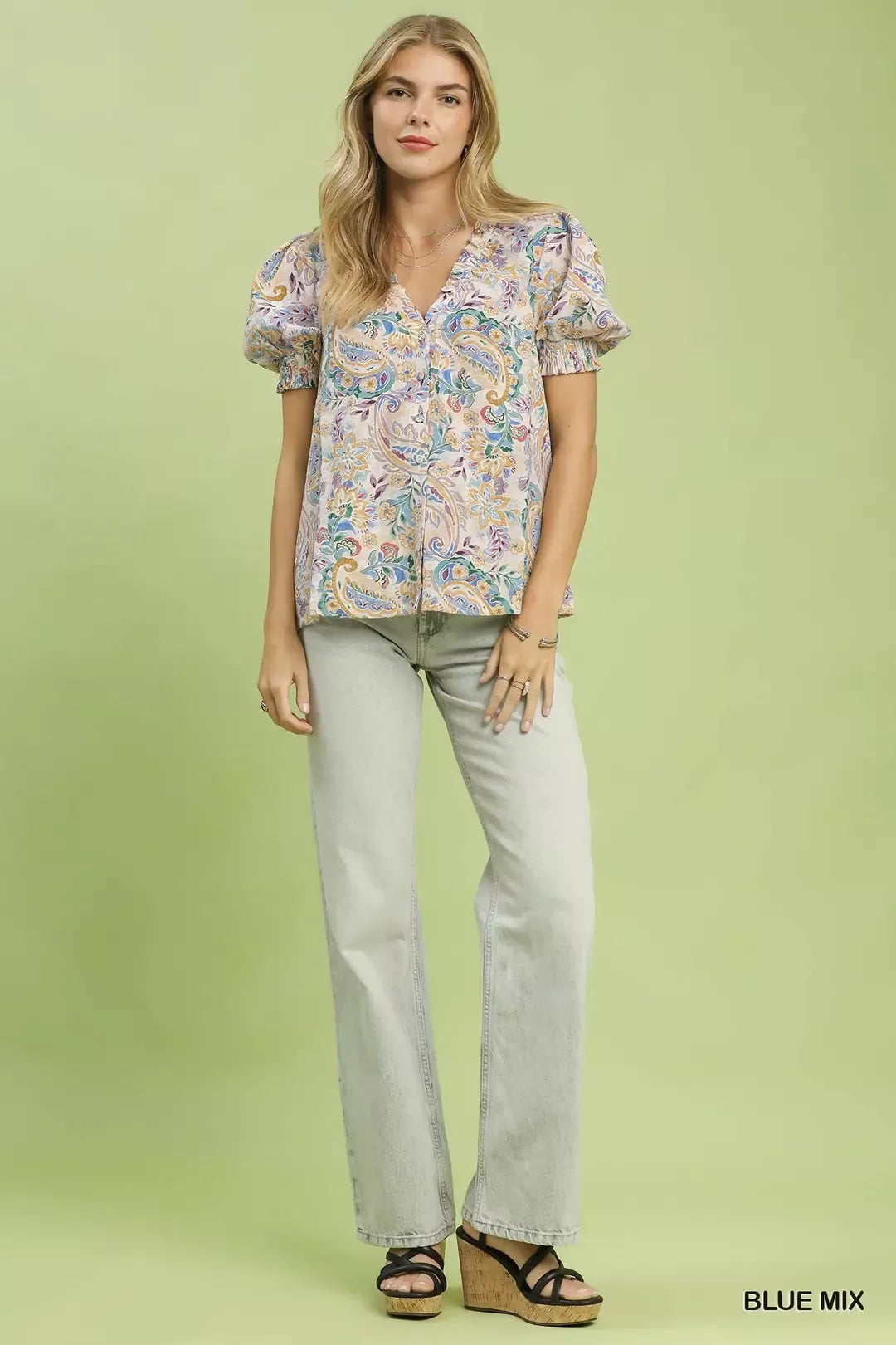 lightweight paisley floral boho blouse with puff sleeves and ruffled neckline in soft pastel tones