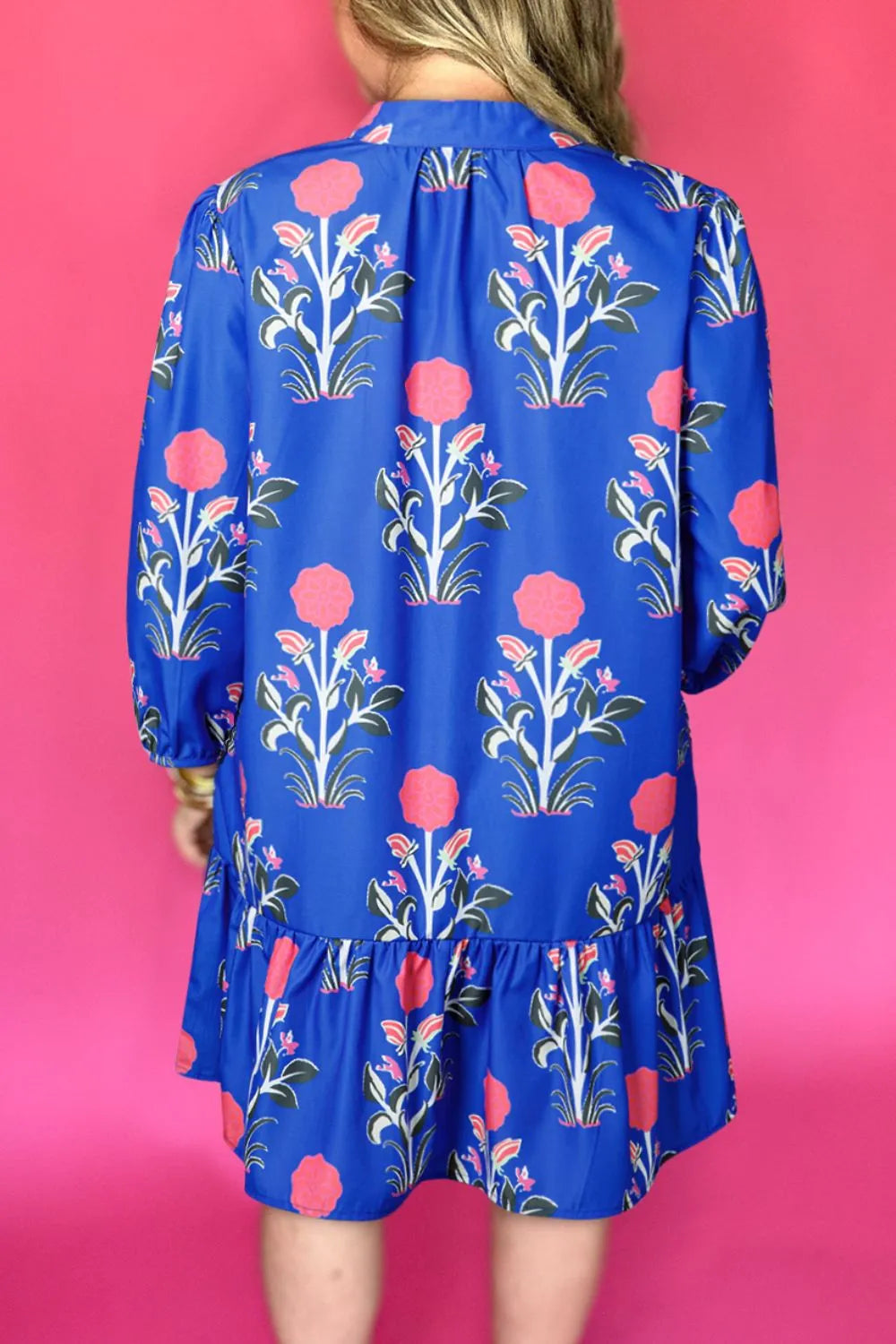 Cobalt blue long sleeve dress with pink floral print and ruffle hem – Midnight Bloom style from A Whimsical Affair.
