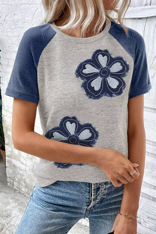 heather gray raglan t-shirt with oversized distressed navy daisy floral appliqué and blue sleeves