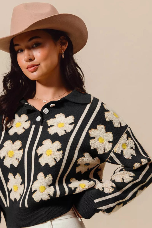 Midnight Verve Floral Stripe Sweater – black knit top with floral and stripe patterns, polo collar, and buttoned neckline.