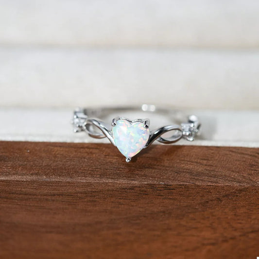 Heart-shaped opal ring with platinum-plated sterling silver infinity band and zircon accents