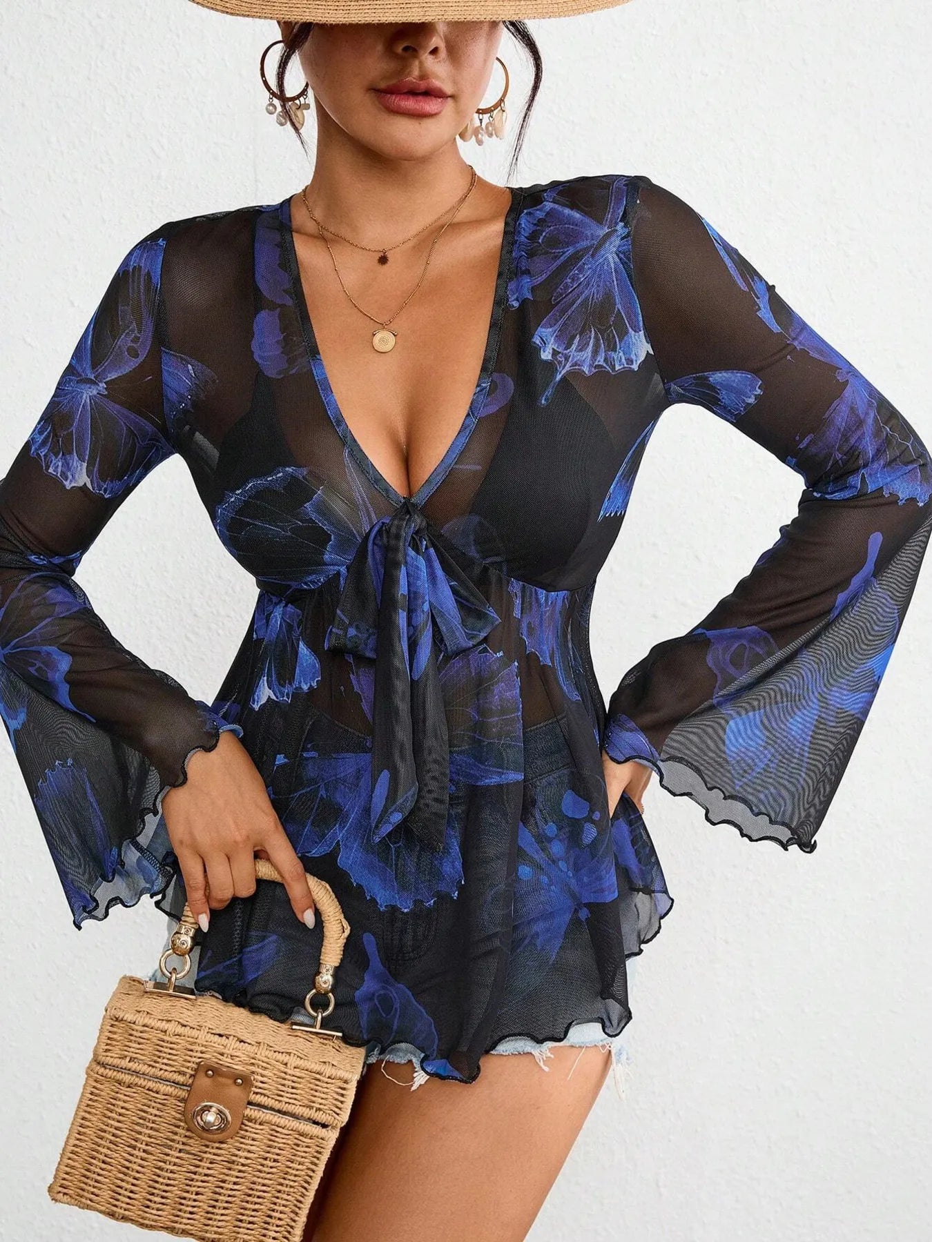 Moonlit Muse Blouse – sheer tie-front flare sleeve top in deep navy blue.