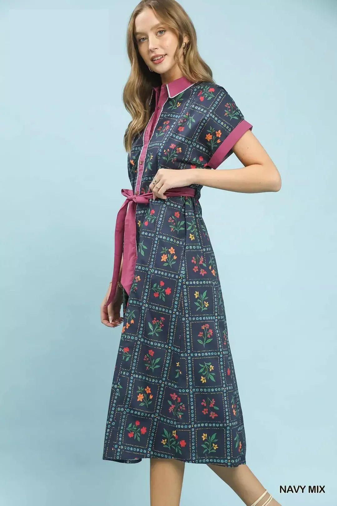 navy floral midi dress with button-front detail and belted waist in a romantic boho style