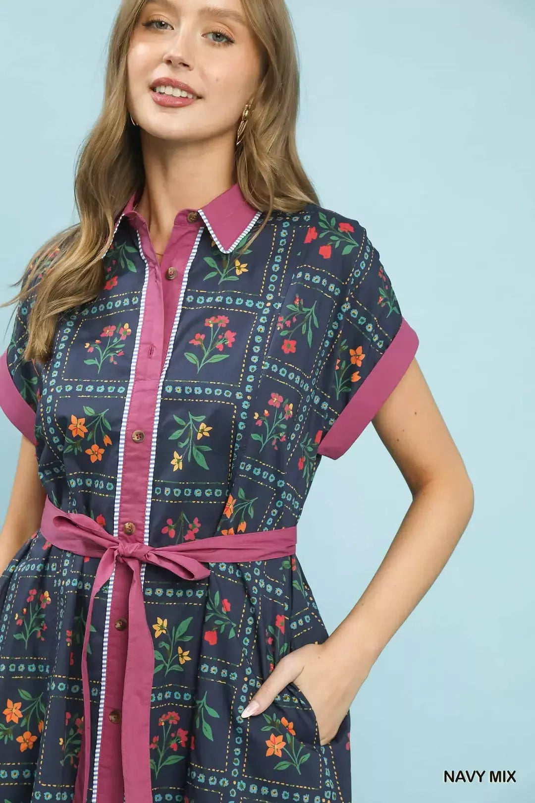 navy floral midi dress with button-front detail and belted waist in a romantic boho style