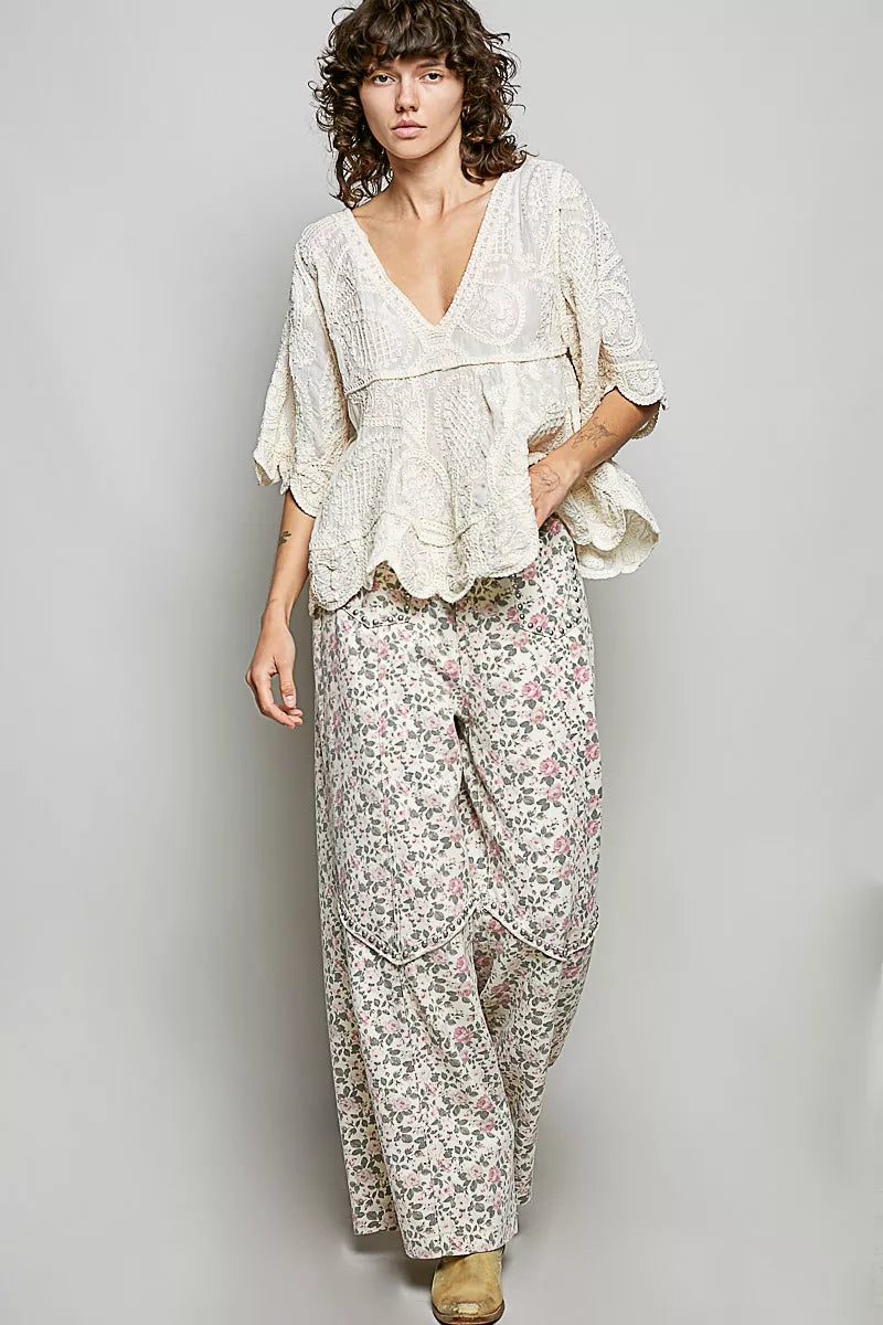Bohemian crochet V-neck top with scalloped hem and short sleeves in a vintage wash