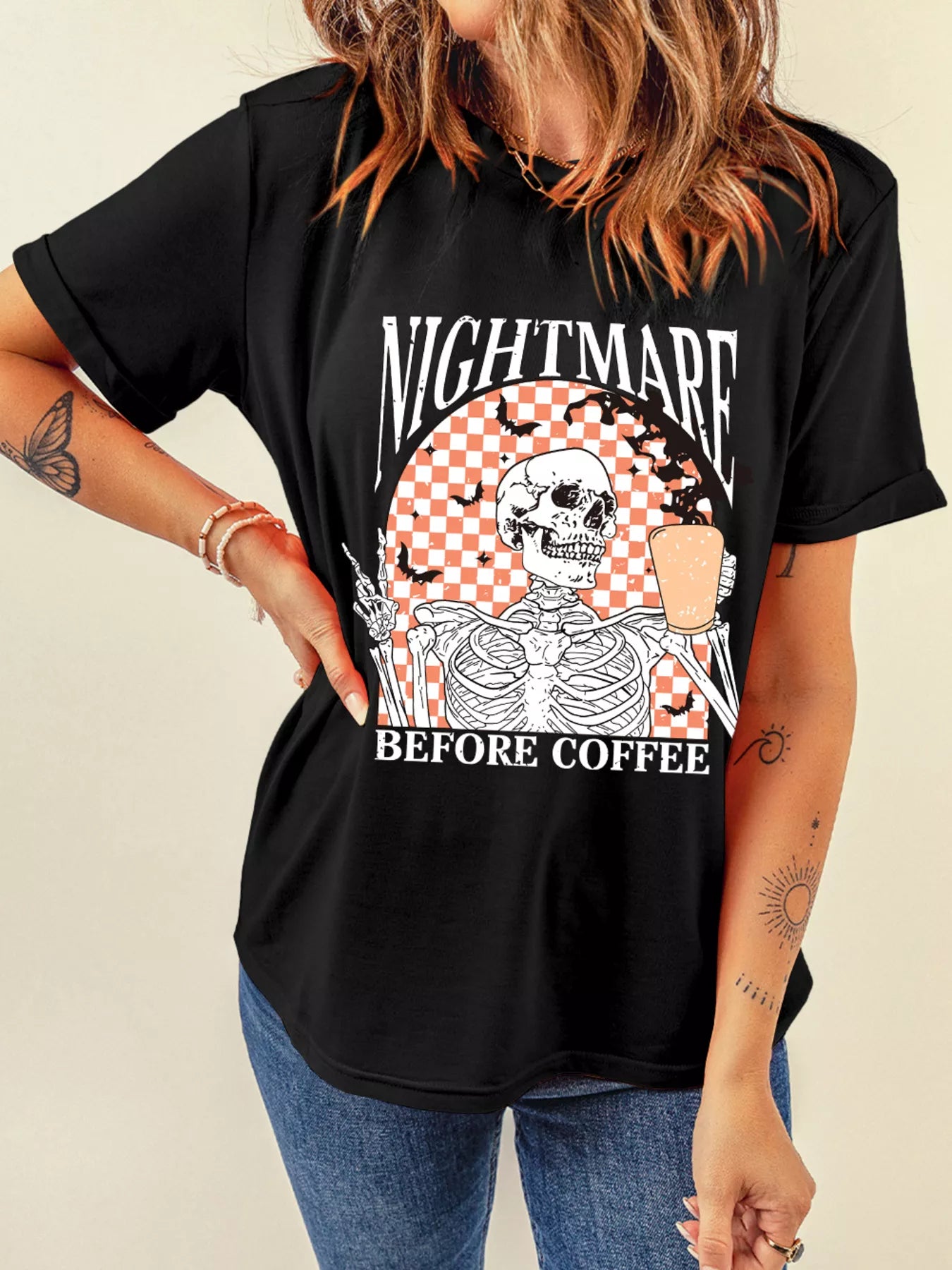 Black Halloween tee with skeleton holding coffee and “Nightmare Before Coffee” text – Nightmare style from A Whimsical Affair.
