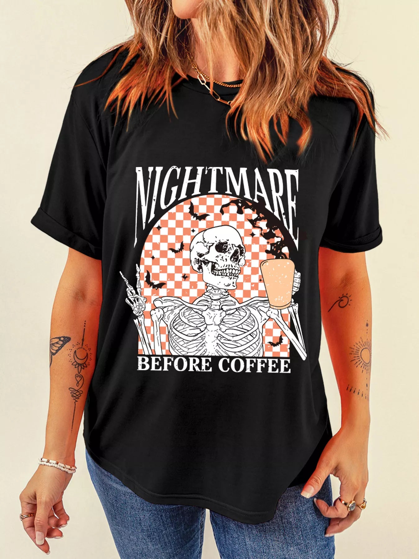 Black Halloween tee with skeleton holding coffee and “Nightmare Before Coffee” text – Nightmare style from A Whimsical Affair.