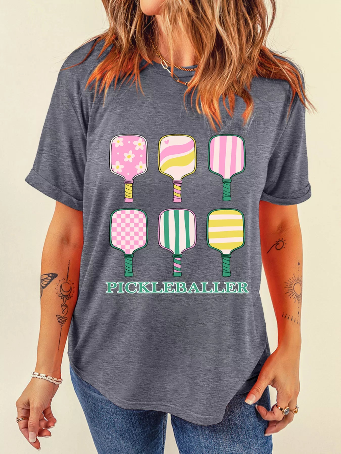 Paddle Party Tee – playful pastel pickleball paddles printed on casual gray t-shirt.