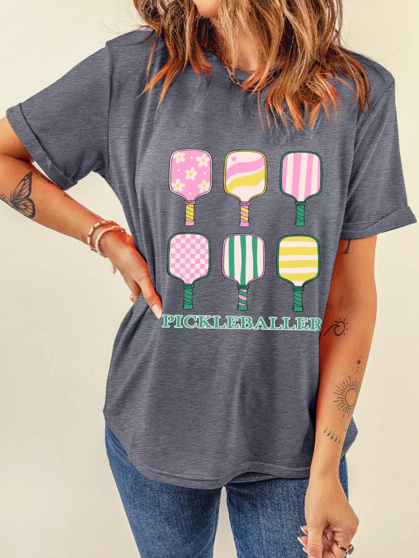 Paddle Party Tee – playful pastel pickleball paddles printed on casual gray t-shirt.