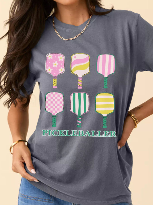 Paddle Party Tee – playful pastel pickleball paddles printed on casual gray t-shirt.