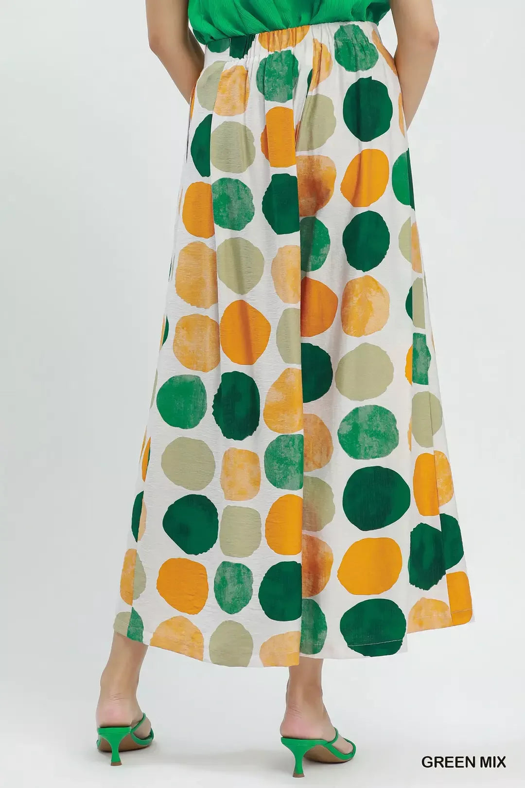 Colorful dot print wide-leg pants with pockets, a relaxed fit, and a flowy lightweight silhouette.