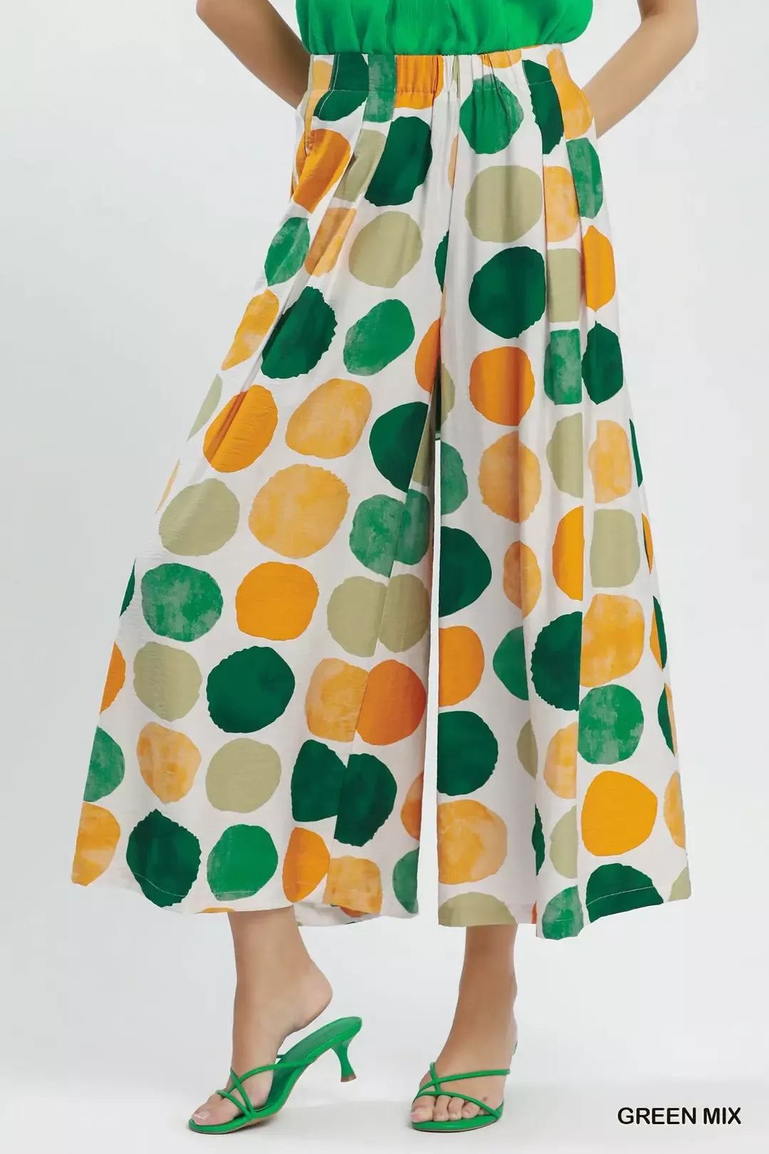 Colorful dot print wide-leg pants with pockets, a relaxed fit, and a flowy lightweight silhouette.