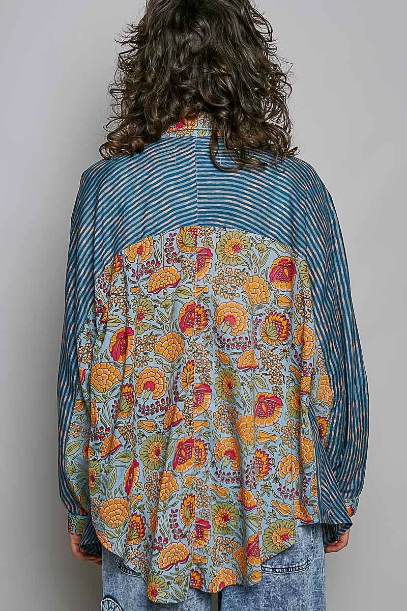 Boho patchwork button-up shirt with mixed floral paisley panels, vertical stripe details, long sleeves, and cotton woven fabric.