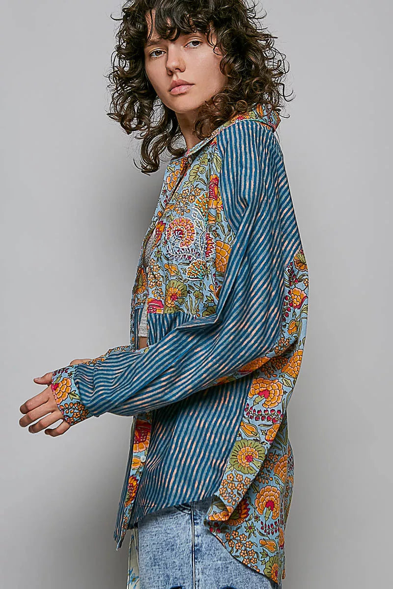 Boho patchwork button-up shirt with mixed floral paisley panels, vertical stripe details, long sleeves, and cotton woven fabric.