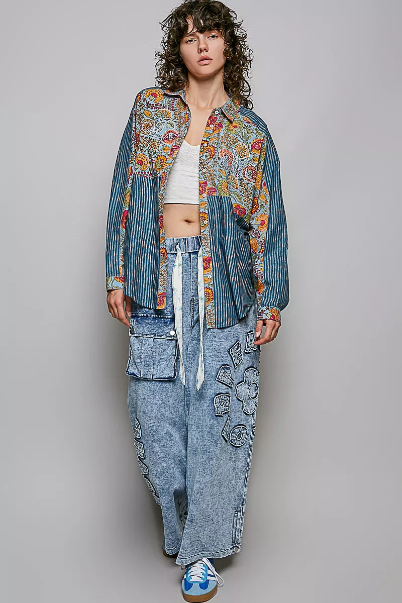 Boho patchwork button-up shirt with mixed floral paisley panels, vertical stripe details, long sleeves, and cotton woven fabric.