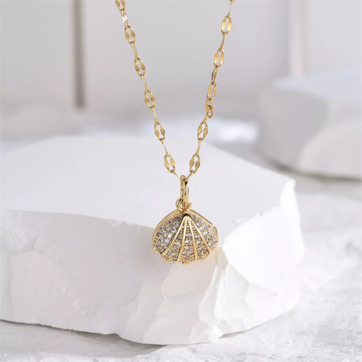 Ocean inspired gold pearl pendant necklace