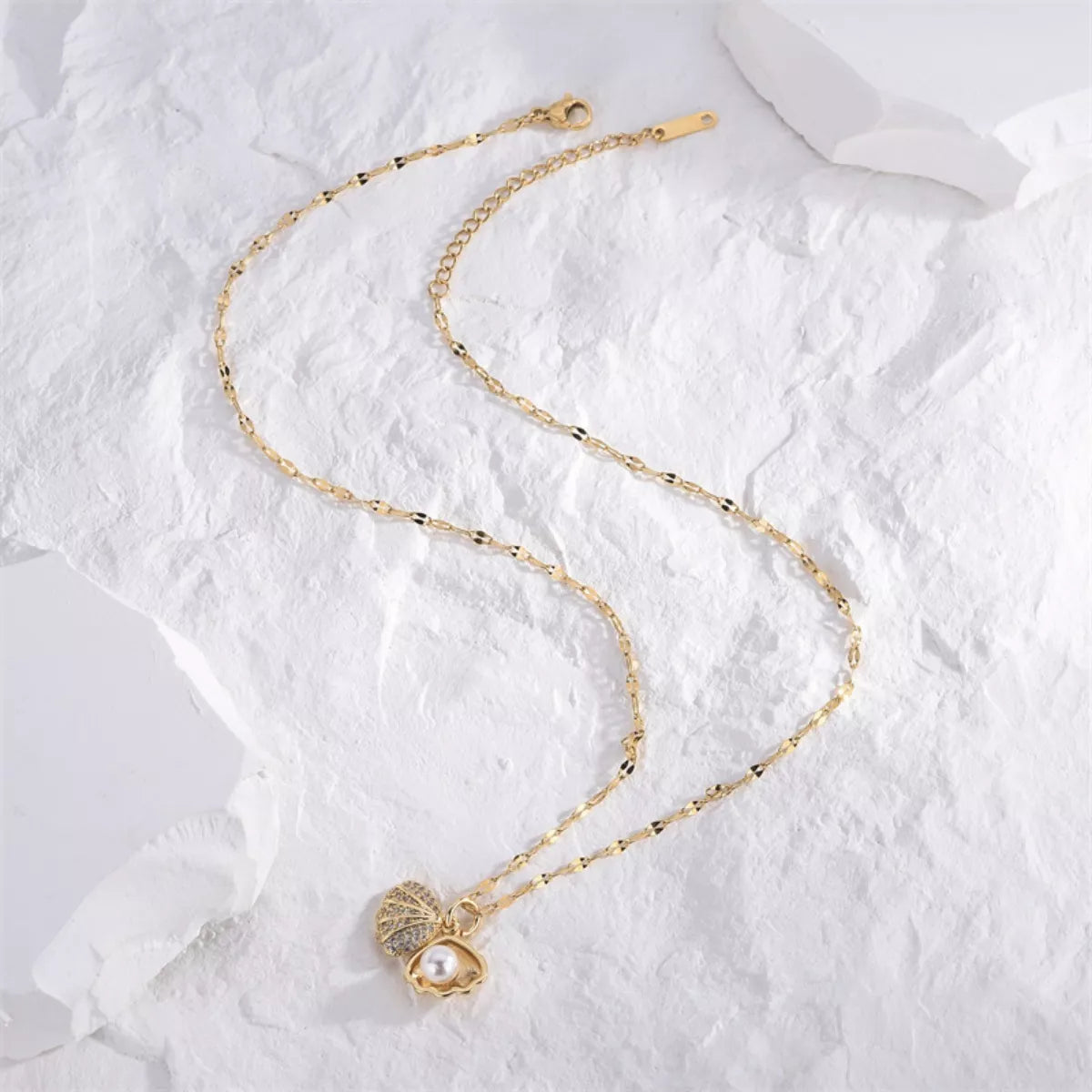 Ocean inspired gold pearl pendant necklace