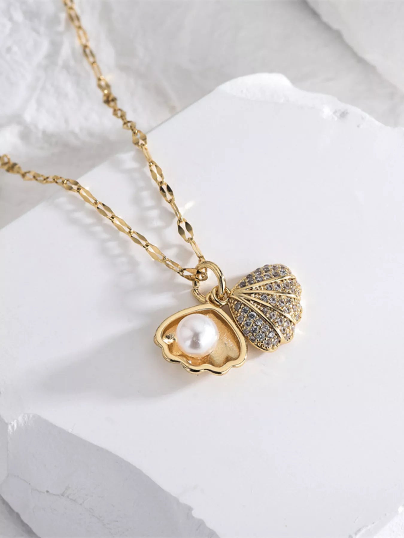 Ocean inspired gold pearl pendant necklace