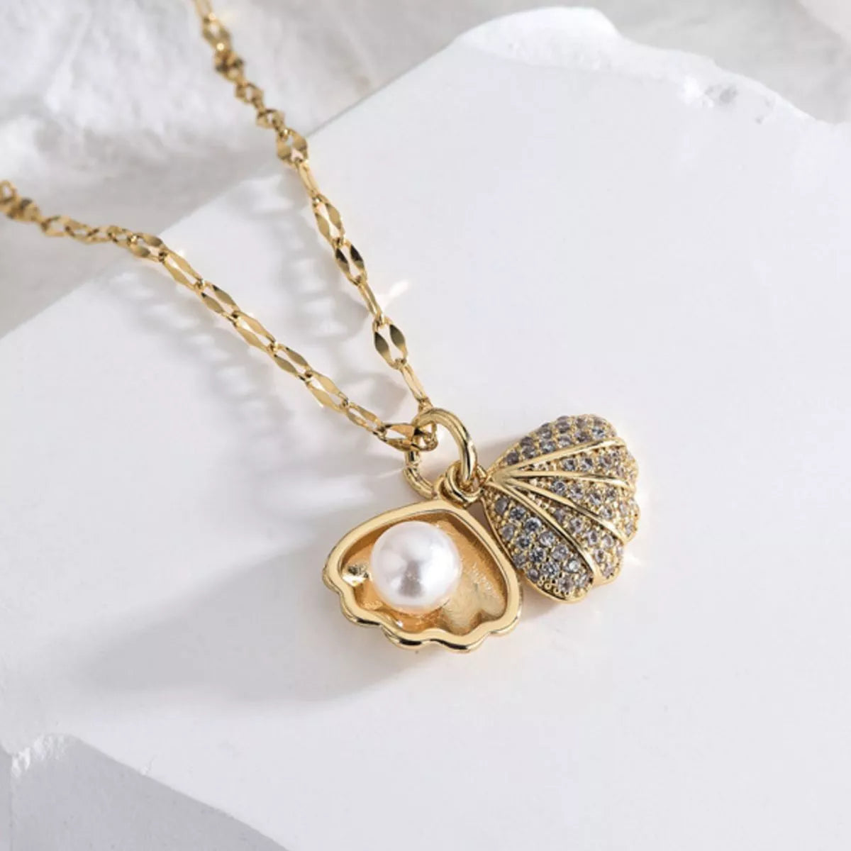 Ocean inspired gold pearl pendant necklace
