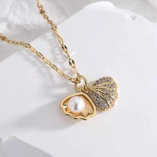 Ocean inspired gold pearl pendant necklace
