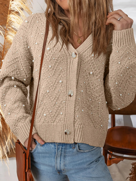 Pearl Whimsy Button Cardigan – V neck knit sweater with pearl embellishments and button front in beige.