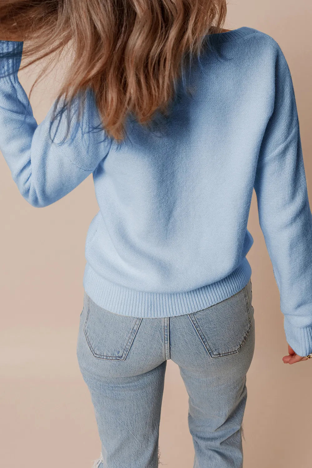 Whimsical boutique floral appliqué knit sweater with relaxed fit