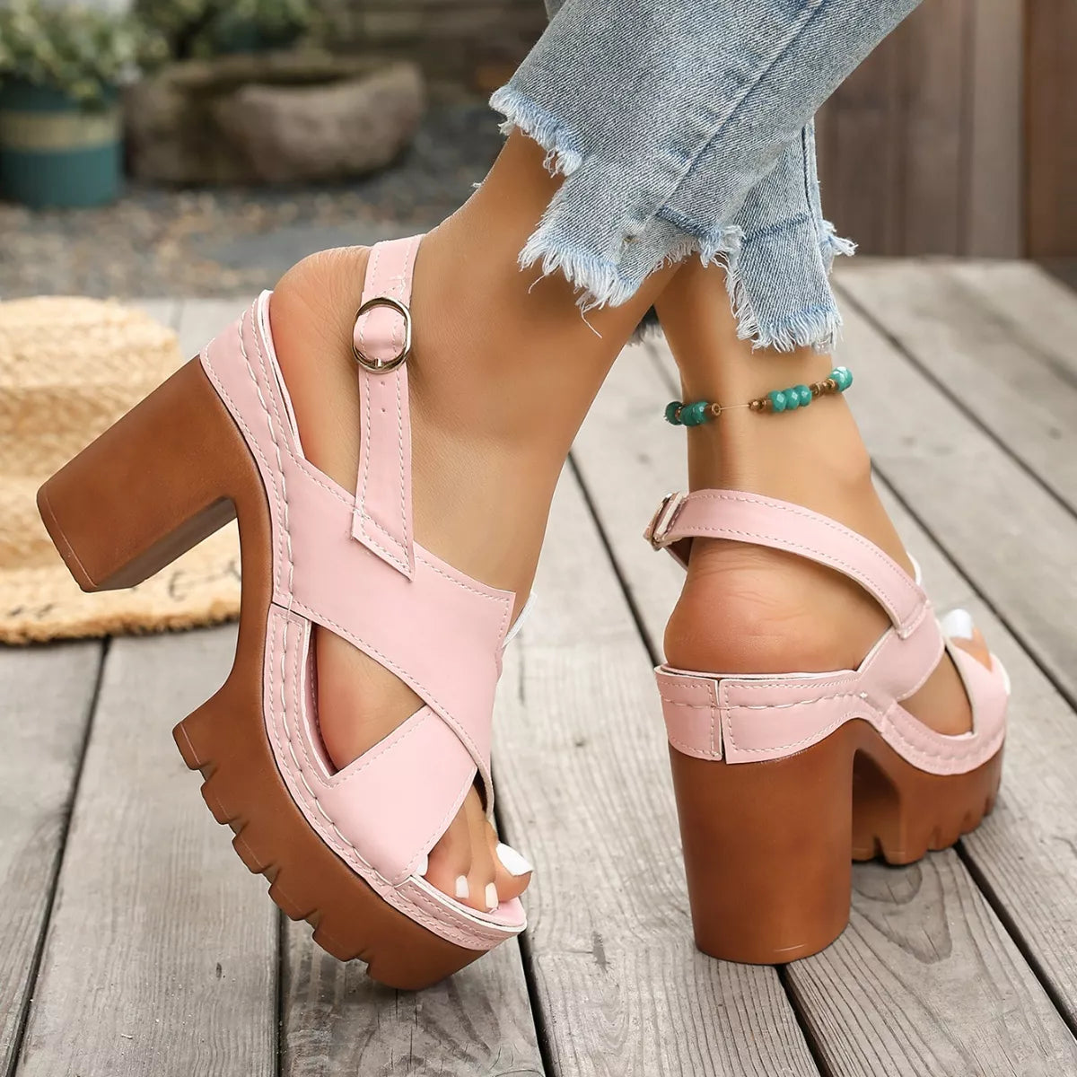 retro chunky platform sandals with crisscross straps and boho-inspired high heel silhouette in pastel tones