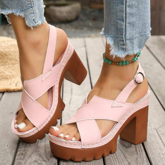 retro chunky platform sandals with crisscross straps and boho-inspired high heel silhouette in pastel tones
